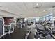 Large fitness center with modern equipment and floor-to-ceiling windows with city views at 45 Ivan Allen Jr Blvd # 2203, Atlanta, GA 30308