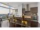 Contemporary kitchen with island seating, stainless steel appliances, and a spectacular city view at 45 Ivan Allen Jr Blvd # 2203, Atlanta, GA 30308