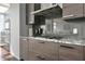 Modern kitchen features sleek cabinetry, stainless steel appliances, and granite countertops at 45 Ivan Allen Jr Blvd # 2203, Atlanta, GA 30308