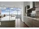 Sleek kitchen featuring stainless steel appliances, granite countertops, and plenty of natural light at 45 Ivan Allen Jr Blvd # 2203, Atlanta, GA 30308