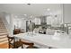 Bright kitchen featuring a large island, stainless steel appliances, and modern lighting at 4041 Blanton Sw Ave, Atlanta, GA 30331