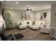 Stylish living room featuring modern furniture, a fireplace, hardwood floors, and a cozy atmosphere at 5030 Mundy Dr, Cumming, GA 30028