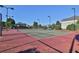 Well-maintained community tennis court offering a great space for recreational play and exercise under the open sky at 5030 Mundy Dr, Cumming, GA 30028