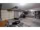 Large garage space with multiple garage doors and high ceilings for maximum storage capacity at 625 W Lake Dr, Oxford, GA 30054