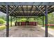 Outdoor kitchen with built-in grill and counter space, ideal for entertaining and enjoying outdoor cooking at 625 W Lake Dr, Oxford, GA 30054