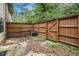 Small, fenced backyard providing a private outdoor area at 6354 Shannon Pkwy # 30C, Union City, GA 30291