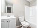 Well-lit bathroom features a combined shower and tub and a white sink vanity at 6354 Shannon Pkwy # 30C, Union City, GA 30291