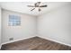 Calm bedroom featuring hardwood floors and a ceiling fan at 6354 Shannon Pkwy # 30C, Union City, GA 30291