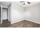 Cozy bedroom with wood-look flooring and a ceiling fan for added comfort at 6354 Shannon Pkwy # 30C, Union City, GA 30291