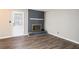 Inviting living room with updated flooring and a charming fireplace at 6354 Shannon Pkwy # 30C, Union City, GA 30291
