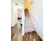 Stairway featuring a carpeted staircase leading to the upper level at 6408 Kennonbriar Ct, Lithonia, GA 30058