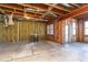 Unfinished basement with exposed beams, insulation, and windows for natural light at 1292 Creekside Se Ter, Smyrna, GA 30082