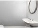 Powder room with a pedestal sink at 1292 Creekside Se Ter, Smyrna, GA 30082