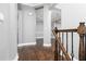 Elegant foyer featuring hardwood floors, gray walls, and detailed trim and column accents at 1292 Creekside Se Ter, Smyrna, GA 30082