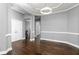 Elegant living room showcasing dark wood floors and white trim at 1292 Creekside Se Ter, Smyrna, GA 30082
