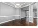 Open-concept living room featuring hardwood floors and recessed lighting at 1292 Creekside Se Ter, Smyrna, GA 30082