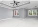 Expansive main bedroom with tray ceiling and ample natural light at 1292 Creekside Se Ter, Smyrna, GA 30082