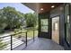 Balcony with metal railings featuring lovely view at 2110 Fairway Ne Cir, Brookhaven, GA 30319