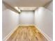 Walk-in closet with hardwood floors and ample storage space at 2110 Fairway Ne Cir, Brookhaven, GA 30319