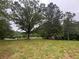 Scenic lot with mature trees offering shade and privacy at 2226 Upper Burris Rd, Canton, GA 30114