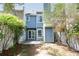 The backyard has a small patio, a garden, and a privacy fence at 3263 Long Iron Pl, Lawrenceville, GA 30044