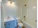 Bright bathroom with a white vanity, toilet, and tub/shower combo at 3263 Long Iron Pl, Lawrenceville, GA 30044