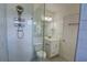 Updated bathroom with a glass enclosed shower, modern fixtures, and a marble vanity at 3263 Long Iron Pl, Lawrenceville, GA 30044