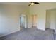 Spacious main bedroom with carpet, ensuite bath and walk-in closet for ample storage at 3263 Long Iron Pl, Lawrenceville, GA 30044
