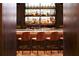 Stylish bar with a well-stocked liquor display and comfortable seating at 3376 Peachtree Ne Rd # 35A, Atlanta, GA 30326