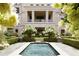 Beautiful courtyard with a reflecting pool, lush greenery, and manicured gardens at 3376 Peachtree Ne Rd # 35A, Atlanta, GA 30326