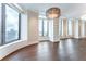 Spacious living area boasts large windows, built-in shelving, and stunning views of the city skyline at 3376 Peachtree Ne Rd # 35A, Atlanta, GA 30326