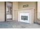 Cozy outdoor patio with marble fireplace, open doorway with kitchen view at 3376 Peachtree Ne Rd # 35A, Atlanta, GA 30326