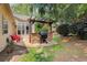 Backyard patio with an outdoor kitchen and grill, perfect for entertaining and outdoor dining at 5220 Wild Cedar Dr, Buford, GA 30518