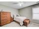 Comfortable bedroom featuring warm colored wood drawers at 5220 Wild Cedar Dr, Buford, GA 30518