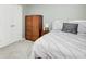 Bedroom showcasing white closet doors and a comfortable bed at 5220 Wild Cedar Dr, Buford, GA 30518