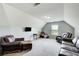 Spacious bonus room with ample seating, offering a comfortable and relaxing space at 5220 Wild Cedar Dr, Buford, GA 30518