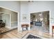 Open entryway with hardwood floors leading to living spaces at 5220 Wild Cedar Dr, Buford, GA 30518