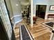 Inviting entryway with wood floors and elegant decor leads into a spacious living area at 5220 Wild Cedar Dr, Buford, GA 30518