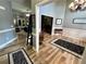 Entryway featuring wood floors, gray walls, and a view into other rooms at 5220 Wild Cedar Dr, Buford, GA 30518
