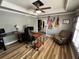 Home office with hardwood floor, desk and chair at 5220 Wild Cedar Dr, Buford, GA 30518