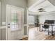 Bright home office with wood floors, desk, and modern fixtures at 5220 Wild Cedar Dr, Buford, GA 30518