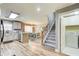 Modern kitchen with stainless steel appliances and adjacent dining area, perfect for Gathering meals at 5220 Wild Cedar Dr, Buford, GA 30518