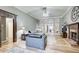 Inviting living room with hardwood floors, fireplace, and lots of natural light at 5220 Wild Cedar Dr, Buford, GA 30518