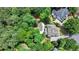An aerial perspective of the residence, highlighting its secluded setting and expansive backyard at 7920 Tintern Trce, Duluth, GA 30097