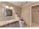 Cozy bathroom with tiled walls, unique sink and shower, offering a comfortable experience at 7920 Tintern Trce, Duluth, GA 30097
