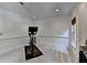 Minimalist exercise room with fitness equipment and a bright window at 7920 Tintern Trce, Duluth, GA 30097