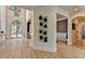 Inviting foyer with hardwood floors and a decorative plant display at 7920 Tintern Trce, Duluth, GA 30097