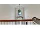 Two story foyer with lots of natural light and an ornate chandelier at 7920 Tintern Trce, Duluth, GA 30097
