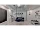 Bright play room area with hanging chair, chalkboard, and plush carpet at 7920 Tintern Trce, Duluth, GA 30097
