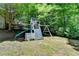 Backyard playground with slide, swing, and playhouse at 7920 Tintern Trce, Duluth, GA 30097